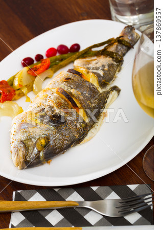 Grilled dorada with baked vegetables 137869557