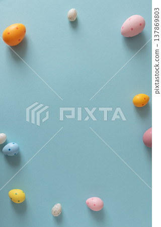 Colorful Easter Eggs on Blue Background. Festive Spring Background 137869803