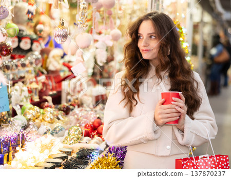 Woman at Christmas market Woman at Christmas market 137870237