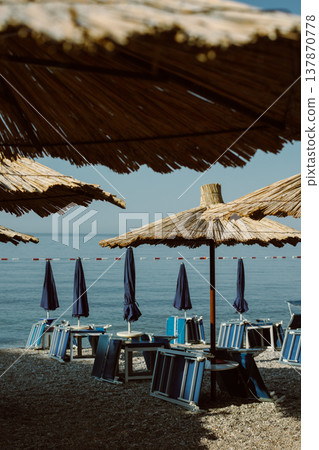 Empty beach near the old town of Budva, Montenegro. Empty beach near the old town of Budva, Montenegro. 137870778