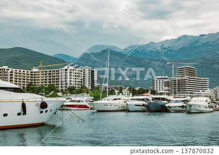 Amazing view of Budva and yacht marina, Montenegro. Beautiful cloudy sky. 137870832
