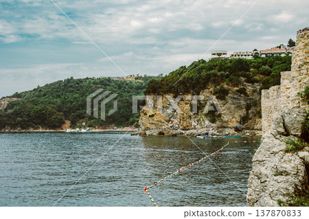 Amazing view of the Adriatic sea near Budva. Beautiful cloudy sky. Amazing view of the Adriatic sea near Budva. Beautiful cloudy sky. 137870833