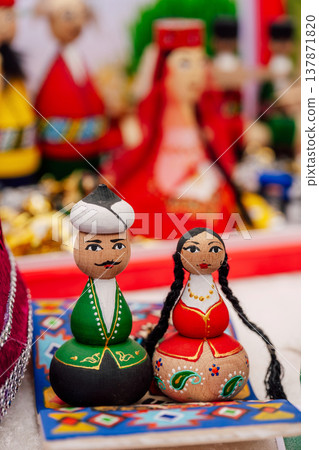 Collection Of Artistically Painted Wooden Dolls Emphasizing Cultural Heritage Measures 137871820