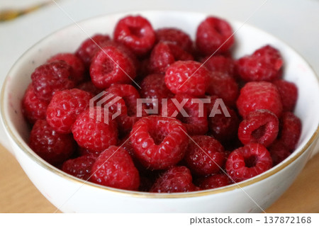 Close-Up of Fresh Raspberries in Bowl 137872168