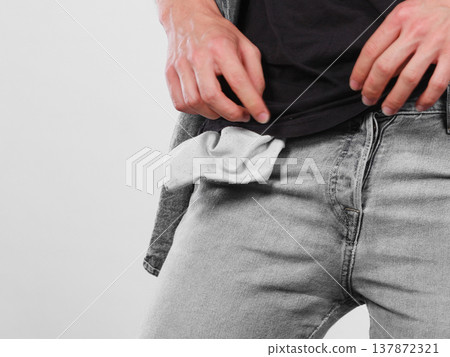 Male showing empty pockets Male showing empty pockets 137872321