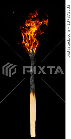 Wooden match burning with orange flame on black isolated background 137873532