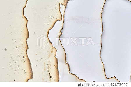 Several sheets of white paper superimposed on each other with heavily burnt edges Several sheets of white paper superimposed on each other with heavily burnt edges 137873602