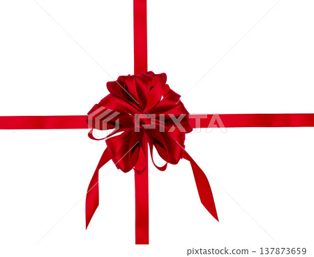 Red satin bow and ribbon intersecting in the center, on an isolated background. 137873659