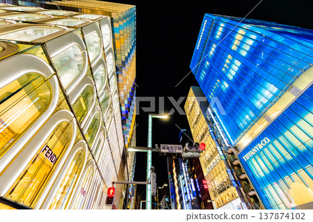 A night view of the Ginza area in Chuo Ward, Tokyo, near the Ginza 5-chome intersection. A night view of the Ginza area in Chuo Ward, Tokyo, near the Ginza 5-chome intersection. 137874102