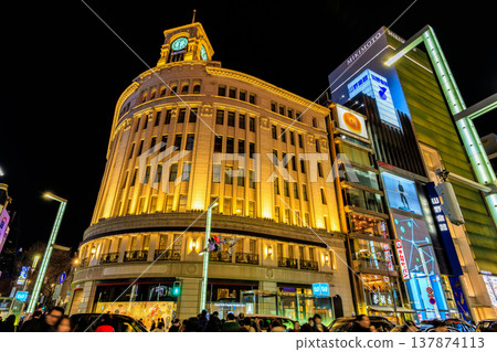 A night view of the Ginza area in Chuo Ward, Tokyo, near the Ginza 4-chome intersection. A night view of the Ginza area in Chuo Ward, Tokyo, near the Ginza 4-chome intersection. 137874113