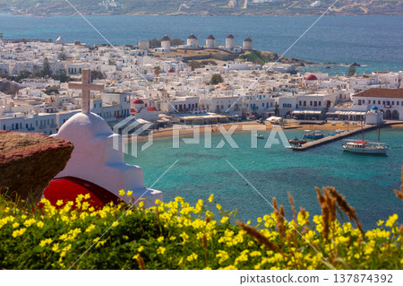 Mykonos town and harbor with windmills from church viewpoint Greece 137874392