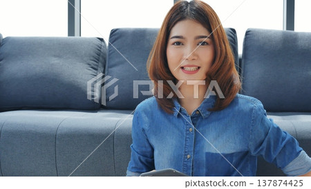 Portrait Asian women happiness smiling laugh happy person looking at camera. Beautiful happy girl portrait joy cheerful. Beauty women smile laughing. Confidence females candid shot smiling face. 137874425
