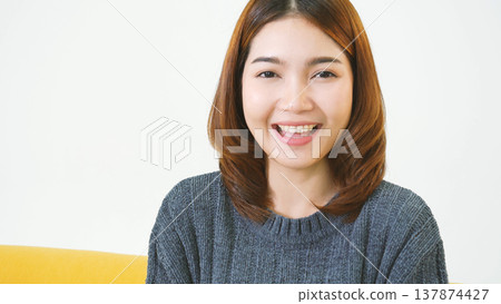Portrait Asian women happiness smiling laugh happy person looking at camera. Beautiful happy girl portrait joy cheerful. Beauty women smile laughing. Confidence females candid shot smiling face. 137874427