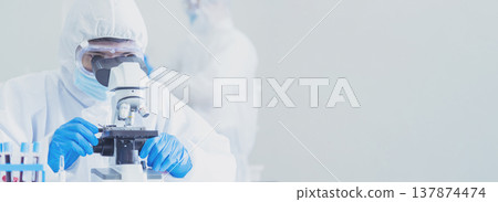 Banner Scientist man look Microscope research in science laboratory. Banner Asian scientist use microbiology microscope in laboratory equipment chemistry lab. Biochemistry experiment with copy space Banner Scientist man look Microscope research in science laboratory. Banner Asian scientist use microbiology microscope in laboratory equipment chemistry lab. Biochemistry experiment with copy space 137874474