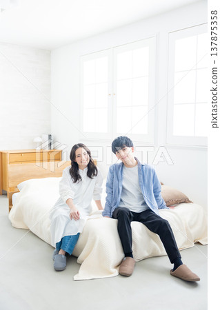 A couple to relax in the bedroom A couple to relax in the bedroom 137875358