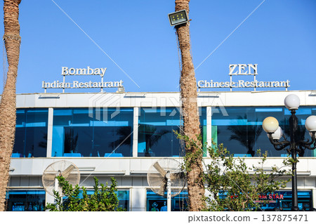 Egypt, Sharm el-Sheikh - September 28, 2025 Soho tourist area during the day. International cuisine restaurant Editorial Egypt, Sharm el-Sheikh - September 28, 2025 Soho tourist area during the day. International cuisine restaurant Editorial 137875471
