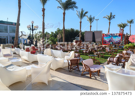 Egypt, Sharm el-Sheikh - September 27, 2025 Soho tourist area during the day. An empty street cafe Editorial Egypt, Sharm el-Sheikh - September 27, 2025 Soho tourist area during the day. An empty street cafe Editorial 137875473