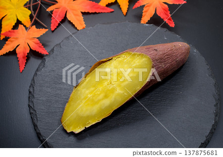 Roasted sweet potatoes in the bountiful autumn 137875681
