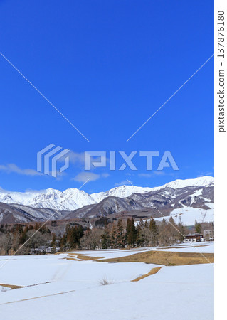 The Northern Alps in early spring as seen from Tsugaike Plateau The Northern Alps in early spring as seen from Tsugaike Plateau 137876180