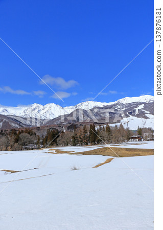 The Northern Alps in early spring as seen from Tsugaike Plateau The Northern Alps in early spring as seen from Tsugaike Plateau 137876181