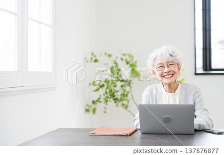 Senior woman in a business suit Business image Senior woman in a business suit Business image 137876877