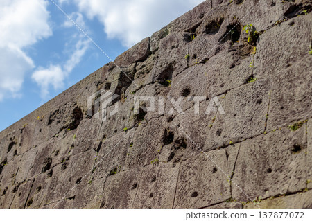 Stone walls bearing bullet holes from the Satsuma Rebellion (Tsurumaru Castle Ruins, Kagoshima City) Stone walls bearing bullet holes from the Satsuma Rebellion (Tsurumaru Castle Ruins, Kagoshima City) 137877072