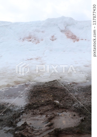 Winter roads with exposed mud due to snowmelt Winter roads with exposed mud due to snowmelt 137877430