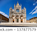 Discover the Atmosphere of Siena Cathedral and Historic Piazza del Duomo.The historic piazza and cathedral create a timeless travel scene with soft movement and cultural identity. 137877579