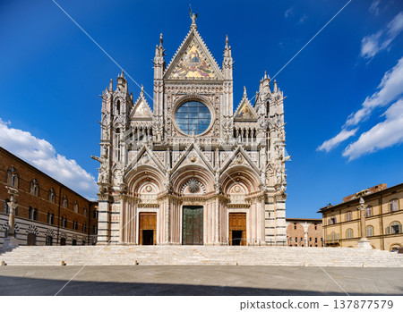Discover the Atmosphere of Siena Cathedral and Historic Piazza del Duomo.The historic piazza and cathedral create a timeless travel scene with soft movement and cultural identity. Discover the Atmosphere of Siena Cathedral and Historic Piazza del Duomo.The historic piazza and cathedral create a timeless travel scene with soft movement and cultural identity. 137877579