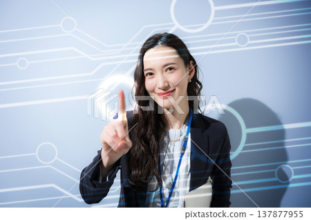 Businesswomen tap into big data such as AI, DX, IT, and M&A. Businesswomen tap into big data such as AI, DX, IT, and M&A. 137877955