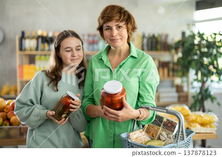 Family chooses marinated tomatoes Family chooses marinated tomatoes 137878123
