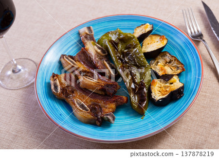 Beef with eggplant and pepper served on platter Beef with eggplant and pepper served on platter 137878219