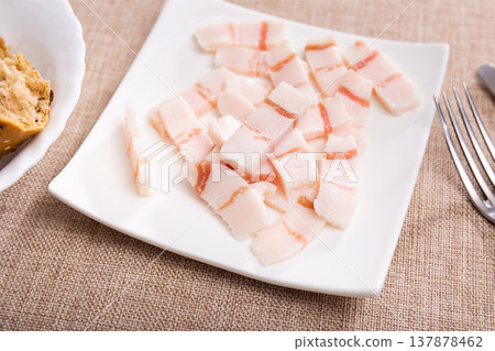 Sliced lard served with bread Sliced lard served with bread 137878462