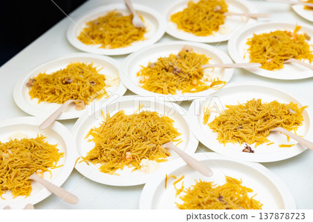 Portions of traditional dish Valencian cuisine Fideua de Marisco Portions of traditional dish Valencian cuisine Fideua de Marisco 137878723
