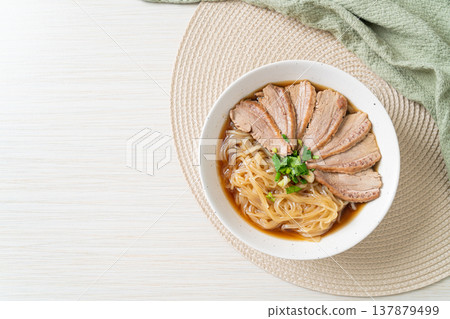 duck noodles with stewed duck soup 137879499