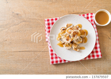 Grills Banana with Caramel Sauce 137879507