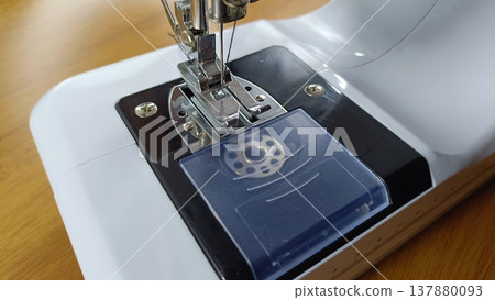 Sewing machine and bobbin Sewing machine and bobbin 137880093