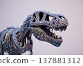 Ornate jeweled dinosaur skull sculpture studded with gems and metallic details 137881312
