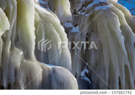 Icicles on the rocks 137881742