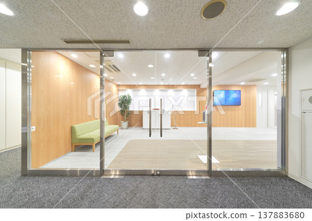Glass-walled corporate entrance Glass-walled corporate entrance 137883680