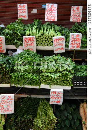 Chinese broccoli (kai lan) and other green vegetables sold in Hong Kong markets. There are also many varieties of other green vegetables. Chinese broccoli (kai lan) and other green vegetables sold in Hong Kong markets. There are also many varieties of other green vegetables. 137884178