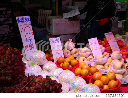 Fruits such as oranges sold at the open-air market. Most of them are imported. Fruits such as oranges sold at the open-air market. Most of them are imported. 137884501