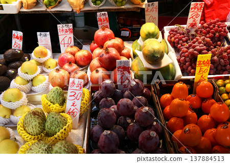 Fruits such as oranges sold at the open-air market. Most of them are imported. 137884513