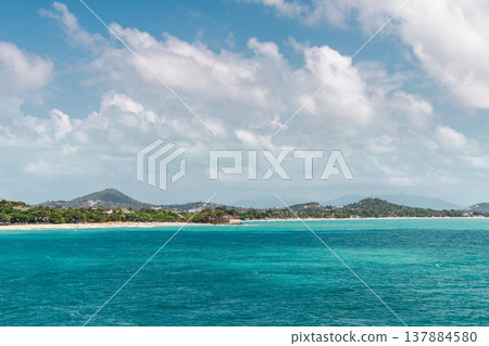 Turquoise sea and rocky tropical coastline view over Chaweng Noi bay toward Chaweng Beach on Koh Samui island Thailand Turquoise sea and rocky tropical coastline view over Chaweng Noi bay toward Chaweng Beach on Koh Samui island Thailand 137884580