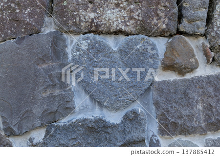 Nagasaki City: The heart-shaped stone at Meganebashi Bridge, a popular tourist spot in Nagasaki. Nagasaki City: The heart-shaped stone at Meganebashi Bridge, a popular tourist spot in Nagasaki. 137885412