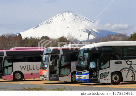 Mount Fuji and a tour bus Mount Fuji and a tour bus 137885491