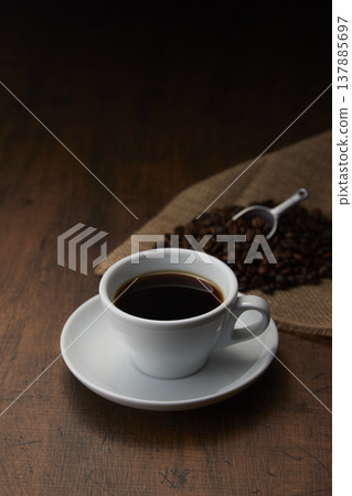 A coffee image with a calm wood grain background. A coffee image with a calm wood grain background. 137885697