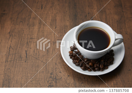 A coffee image with a calm wood grain background. 137885708