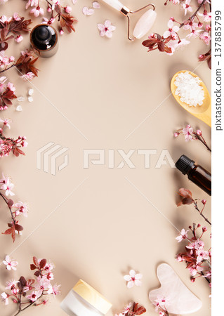 Spa Skincare Frame with Cherry Blossoms and Copy Space Spa Skincare Frame with Cherry Blossoms and Copy Space 137885799