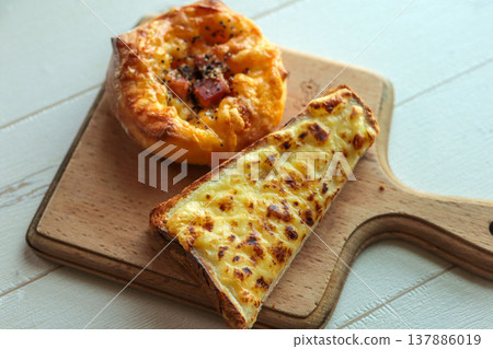 Prepared bread, cheese toast, bacon bread, meal background Prepared bread, cheese toast, bacon bread, meal background 137886019
